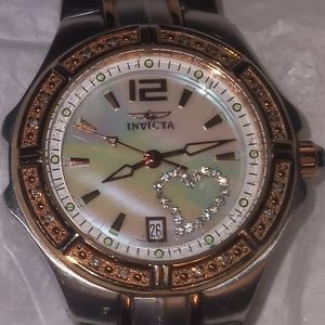 Women's Invicta tritnite watch. Model # 0694.
